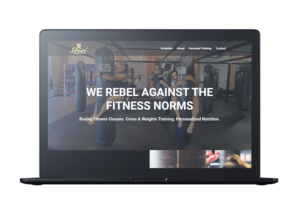 rebel boxing club website on laptop