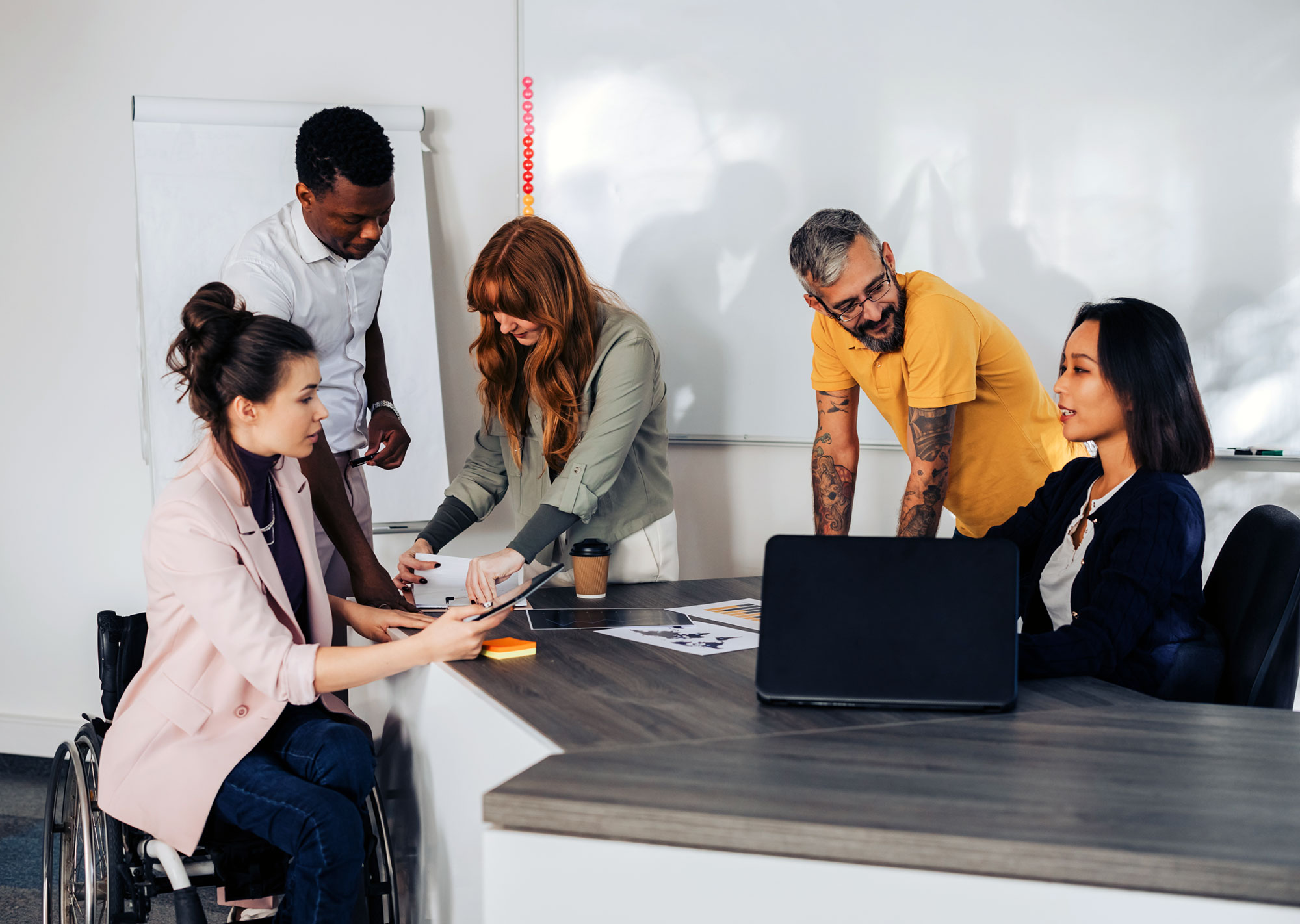 diverse group of team members working on a project