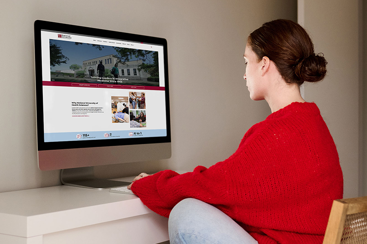 student with computer