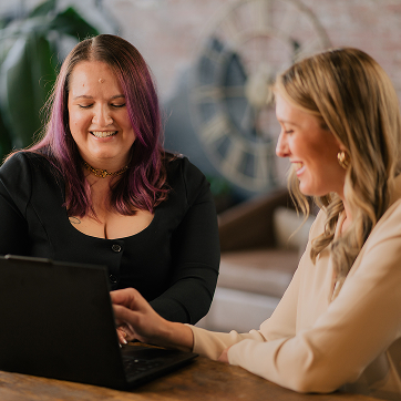 Marisa working with client