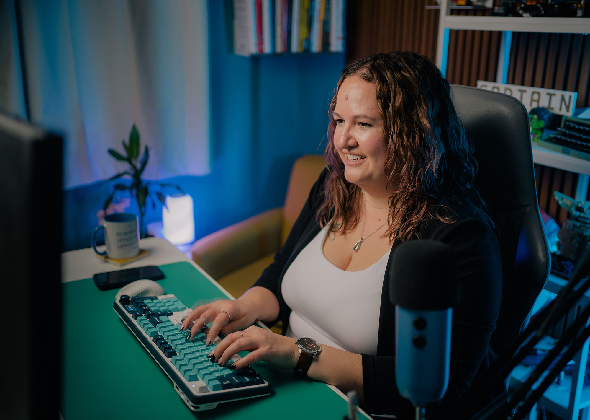 Marisa vanskiver at her computer working through web accessibility remediation