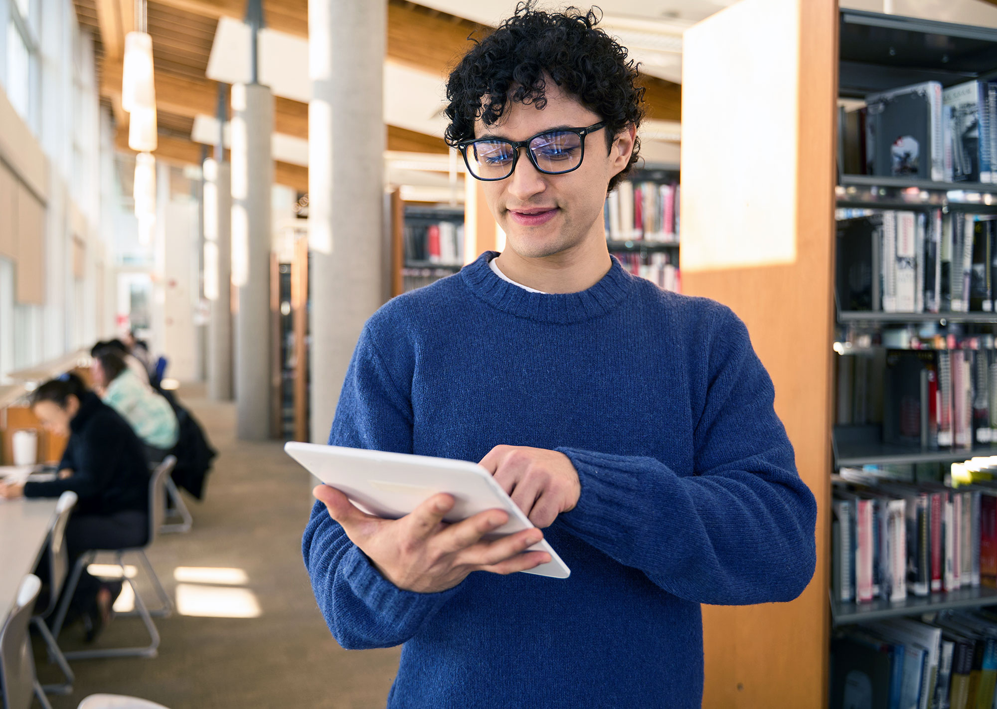 college student using tablet to view PDF
